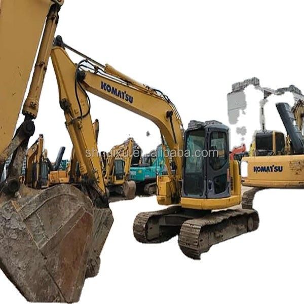 Komatsu Excavateur PC128 utilisé pour la vente de machines de creusement de seconde main