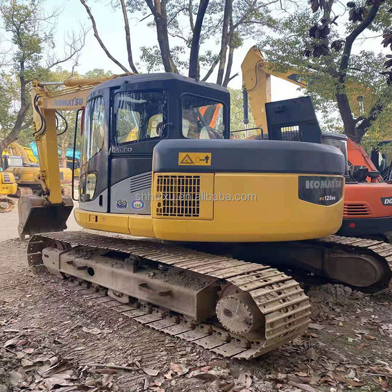 Komatsu Excavateur PC128 utilisé pour la vente de machines de creusement de seconde main